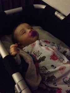 Miss baby in the Air New Zealand bassinet
